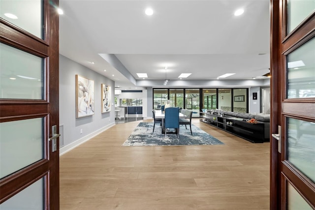 dining space with light hardwood / wood-style floors