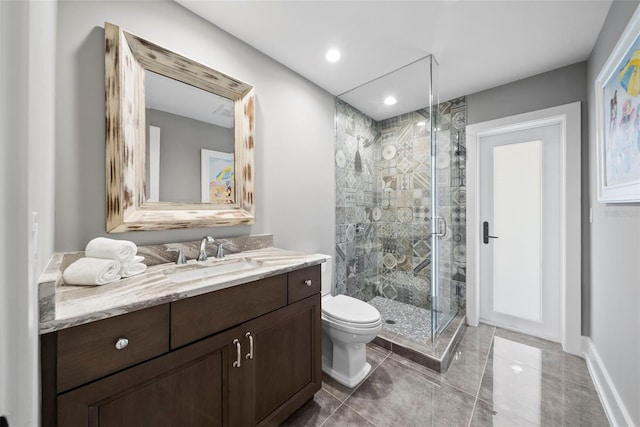 bathroom featuring walk in shower, tile patterned flooring, vanity, and toilet