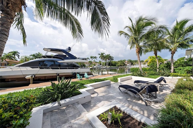 view of home's community featuring a boat dock