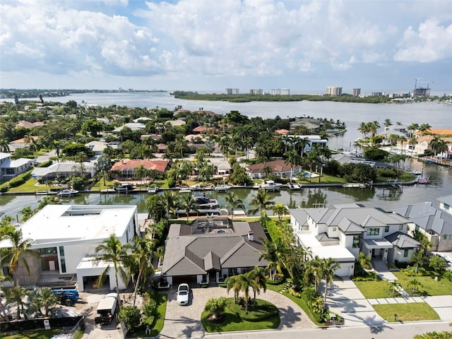 birds eye view of property featuring a water view