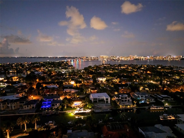 property's view of city with a water view