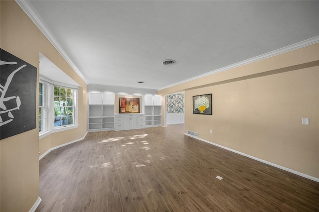 unfurnished living room with wood-type flooring, crown molding, and built in shelves