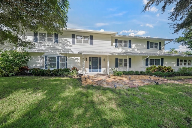 view of front of house with a front lawn