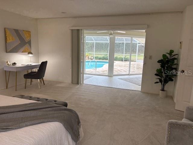 bedroom featuring carpet and access to outside