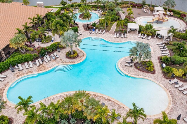 view of swimming pool featuring a patio area