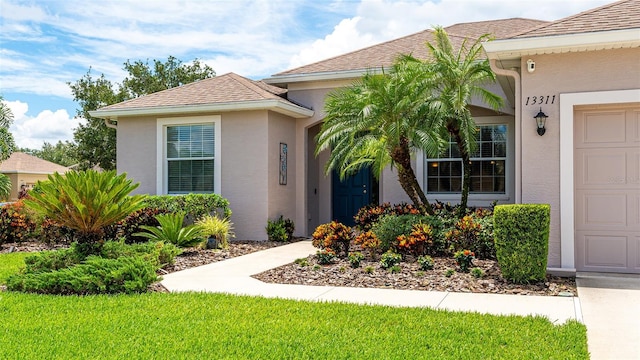 view of front of home featuring a garage