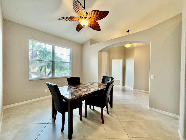 dining room with ceiling fan and light tile patterned floors