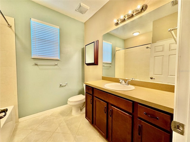 full bathroom with vanity, toilet, tile patterned flooring, and tiled shower / bath