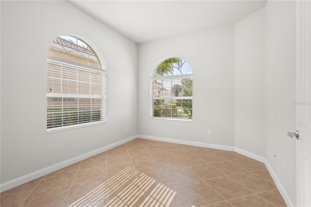 view of tiled spare room