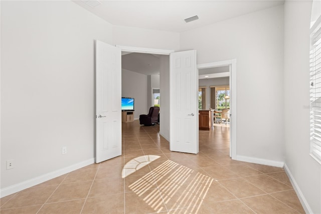 view of tiled empty room