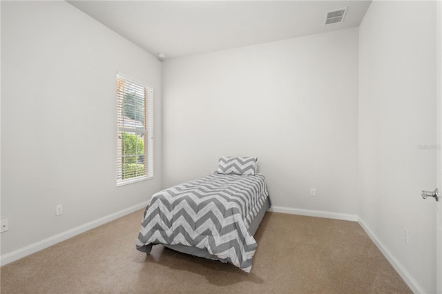 bedroom featuring carpet floors