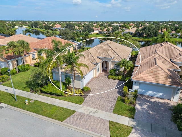 bird's eye view with a water view