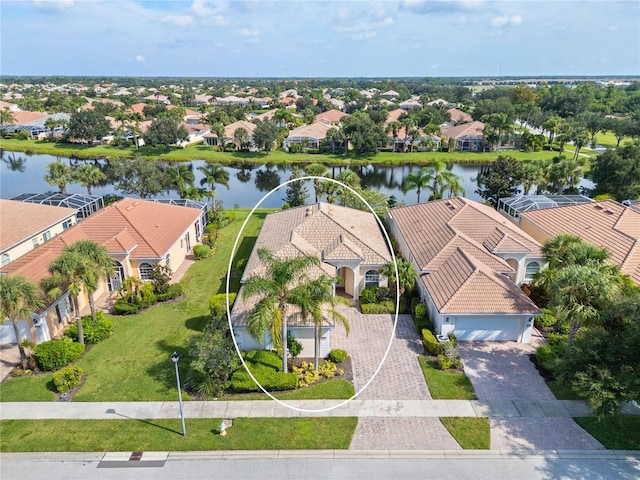 bird's eye view with a water view