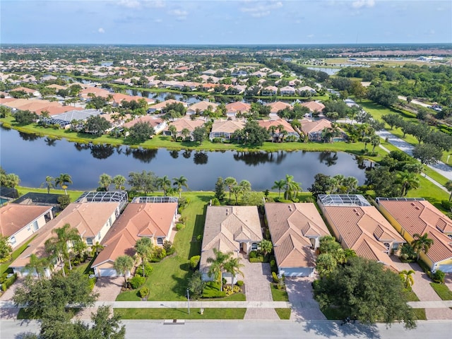 bird's eye view with a water view