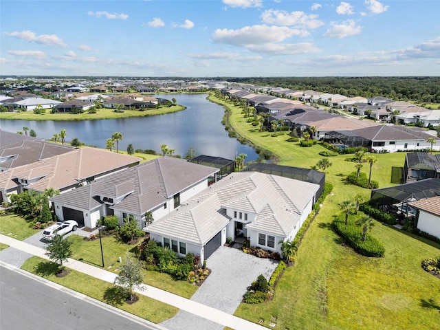 drone / aerial view with a water view