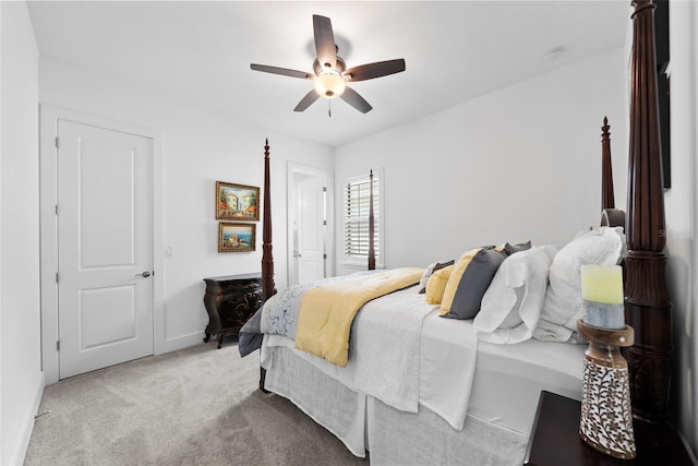 carpeted bedroom featuring ceiling fan