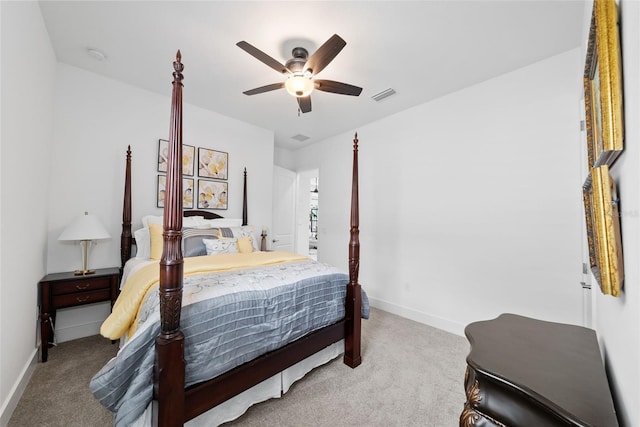 bedroom with light carpet and ceiling fan