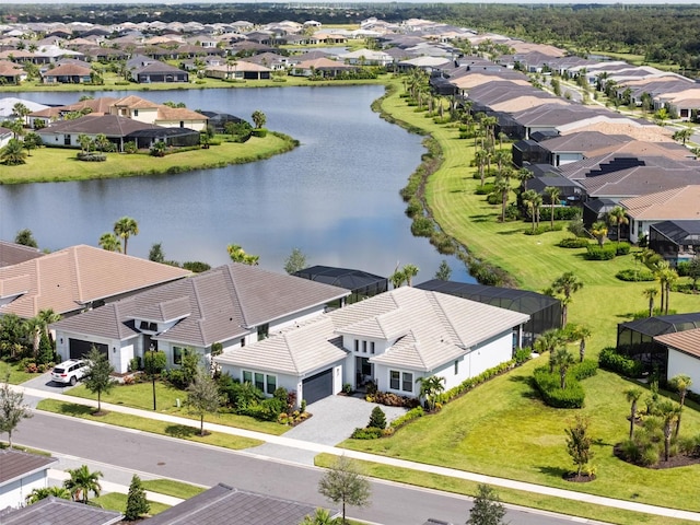 bird's eye view with a water view