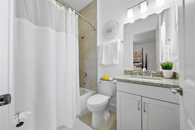 full bathroom with shower / tub combo, vanity, and toilet