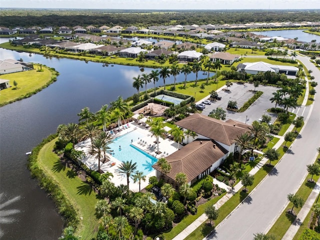 drone / aerial view with a water view