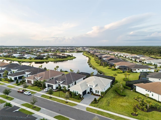 bird's eye view with a water view