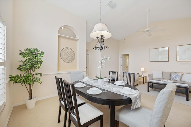 4995 Pepperwood Pl, Venice, FL 34293 - carpeted dining space featuring baseboards, visible vents, high vaulted ceiling, and a ceiling fan