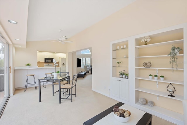 4995 Pepperwood Pl, Venice, FL 34293 - dining area with recessed lighting, light carpet, built in shelves, and ceiling fan