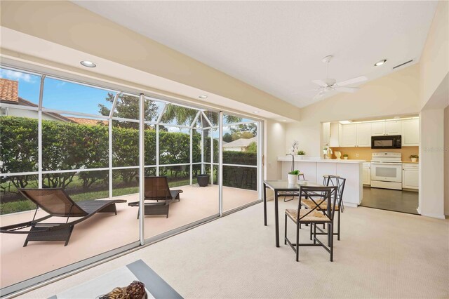 4995 Pepperwood Pl, Venice, FL 34293 - dining area with lofted ceiling, ceiling fan, and recessed lighting