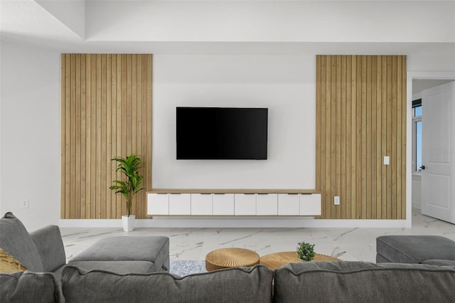 living room with wooden walls