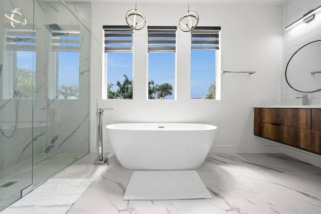 bathroom featuring vanity and separate shower and tub