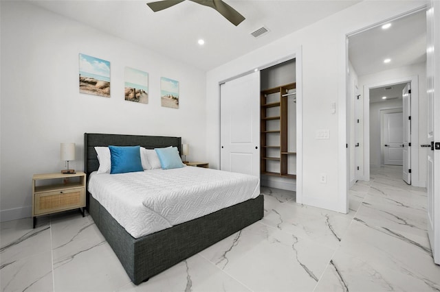 bedroom with ceiling fan and a closet