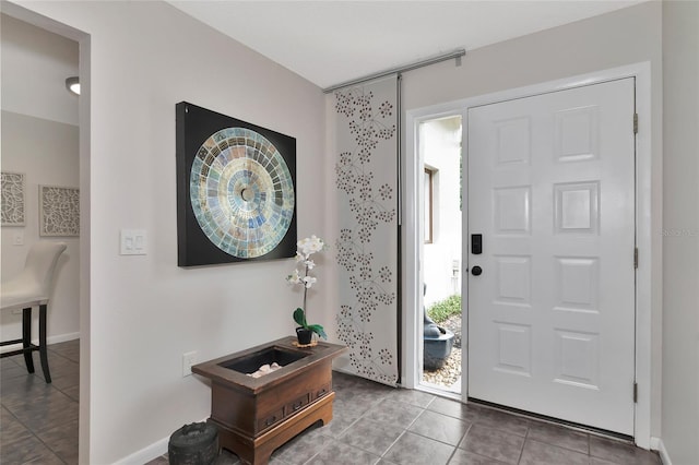 entryway with tile patterned flooring