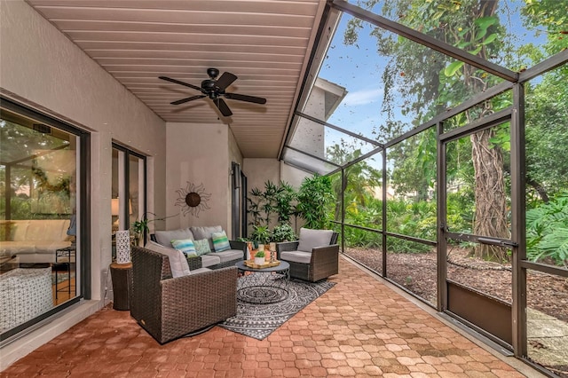 sunroom / solarium with ceiling fan