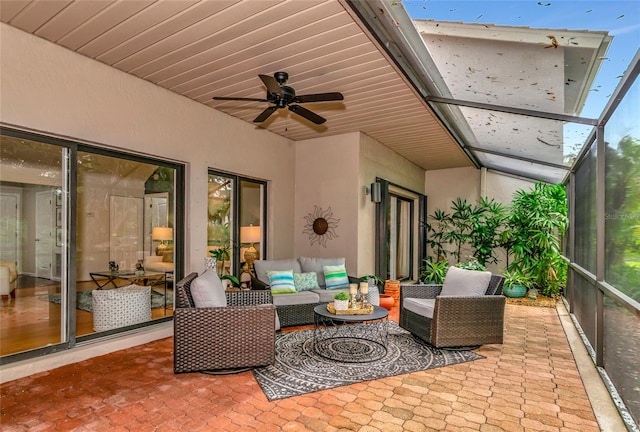 view of patio / terrace with ceiling fan and outdoor lounge area