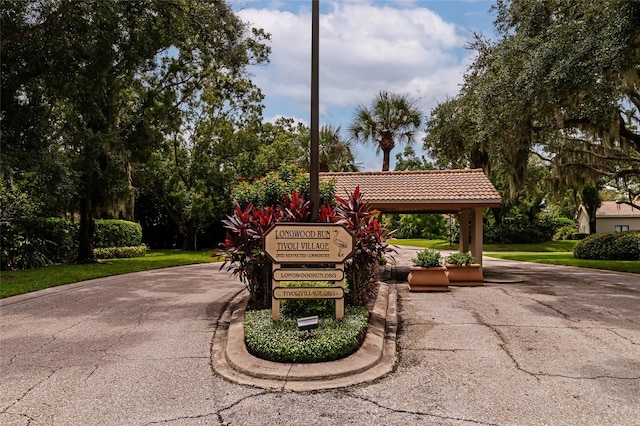 view of home's community with a yard