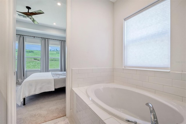 ensuite bathroom featuring a garden tub, ensuite bath, and visible vents