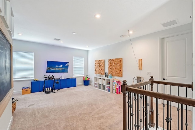 recreation room with recessed lighting, carpet, visible vents, and baseboards