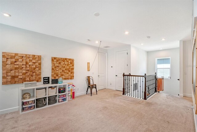 playroom with carpet, baseboards, and recessed lighting