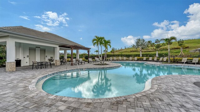 pool featuring a patio