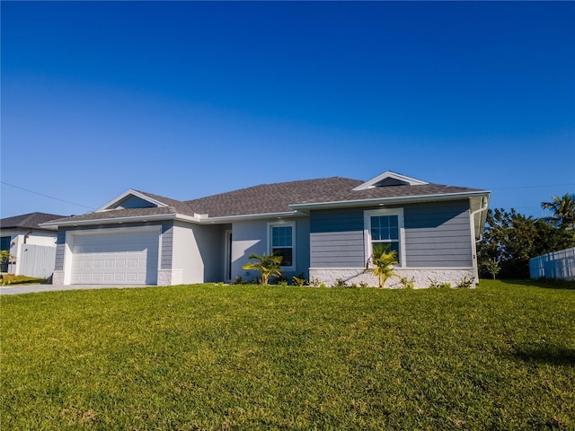 ranch-style house featuring a garage, a front yard, and fence