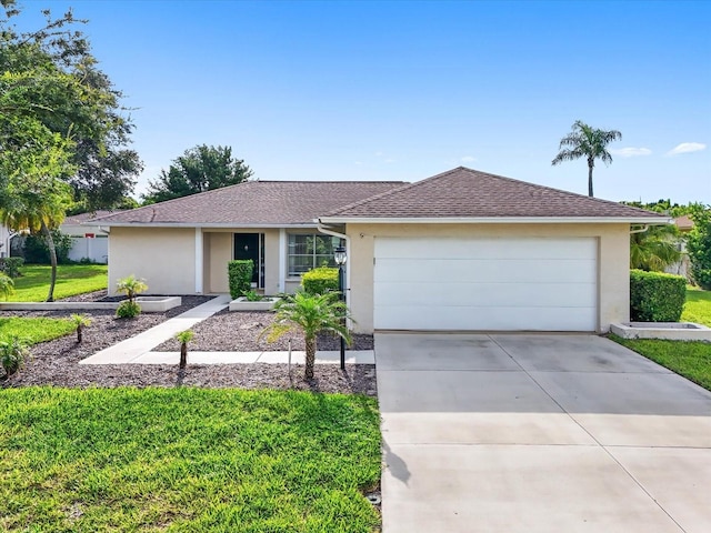 single story home with a garage and a front yard