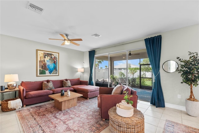 tiled living room featuring ceiling fan