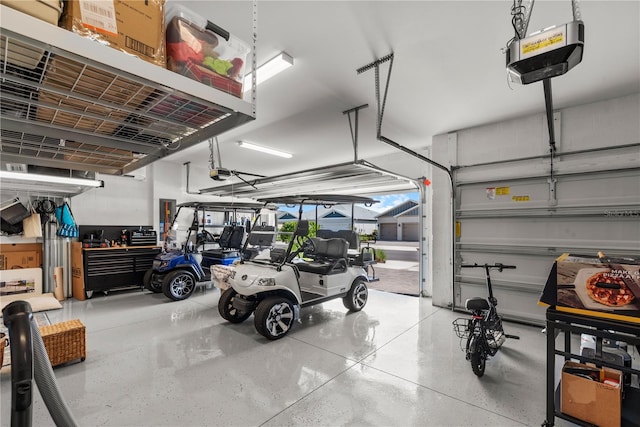 garage featuring a garage door opener