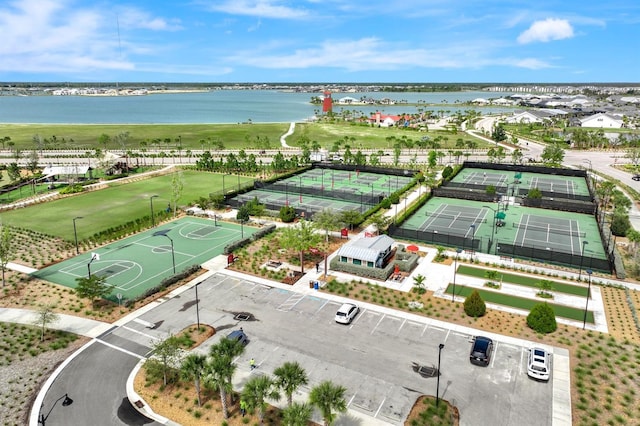 birds eye view of property featuring a water view