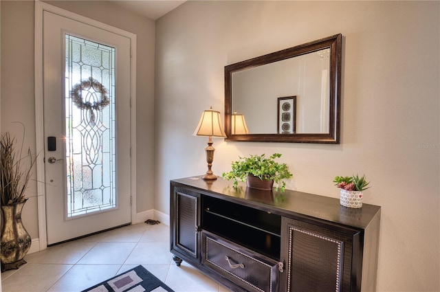 foyer entrance featuring light tile patterned floors