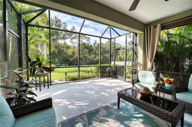 sunroom / solarium with ceiling fan