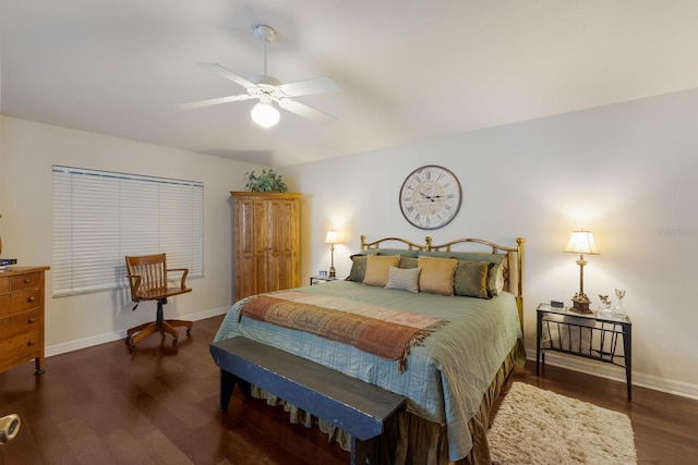 bedroom featuring ceiling fan and dark hardwood / wood-style flooring