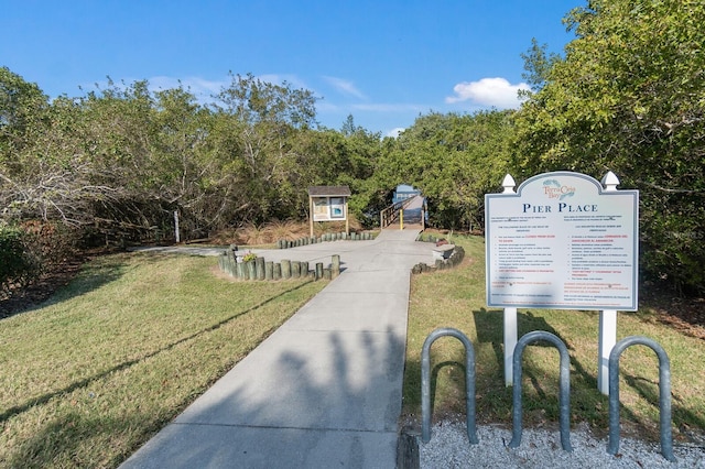 surrounding community featuring a lawn