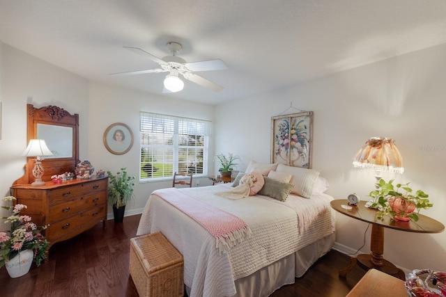 bedroom featuring ceiling fan and dark hardwood / wood-style flooring