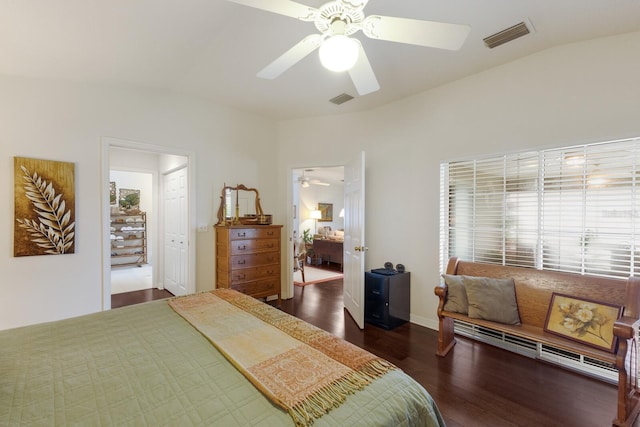 bedroom with ceiling fan and dark hardwood / wood-style floors